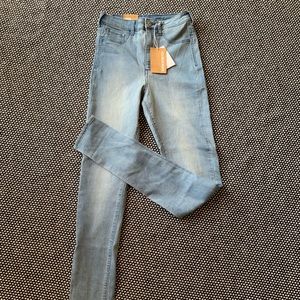 H&M super skinny high wasted jeans 26/32